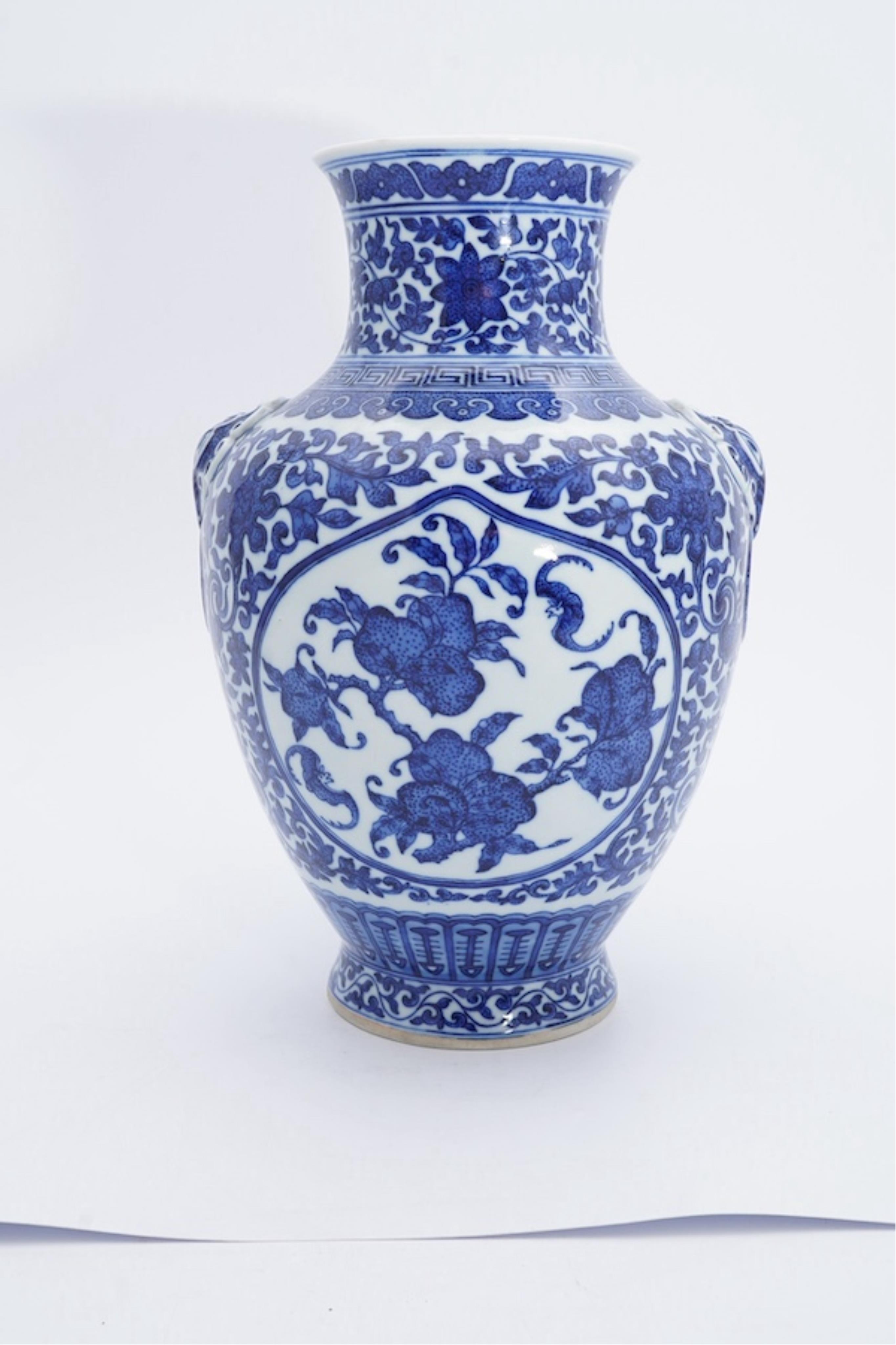 A Chinese blue and white 'peaches' vase, Qianlong mark but later, 27cm high. Condition - good